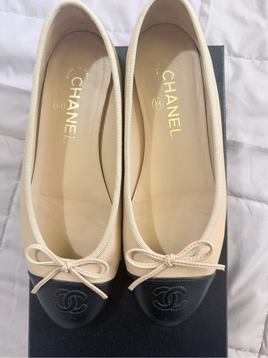 CHANEL Shoes - CHANEL Two-Tone Beige and Black Leather Cap-Toe Ballet Flats